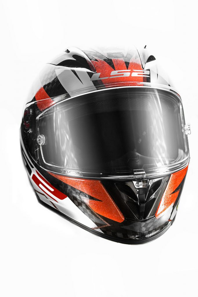 Photo of red and black motorbike helmet.