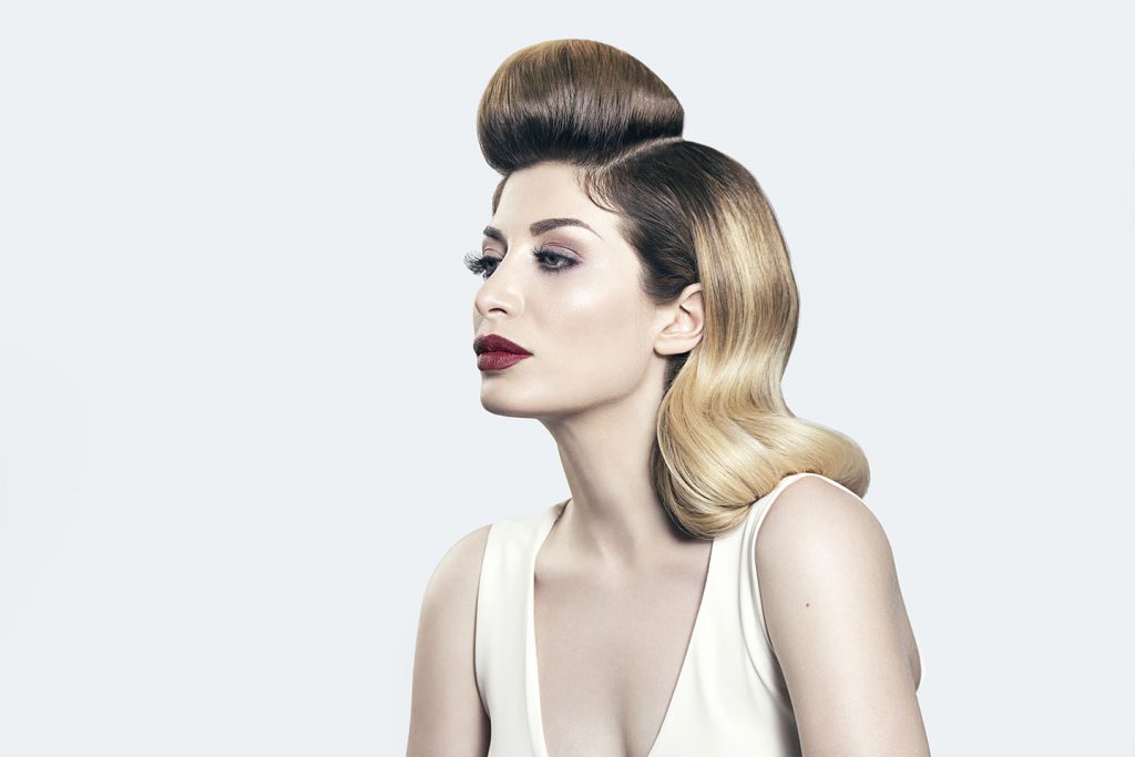 Model with vintage-inspired hairstyle.